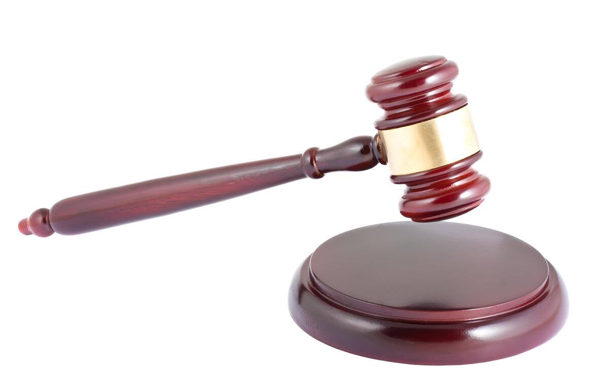 Wooden gavel on white background