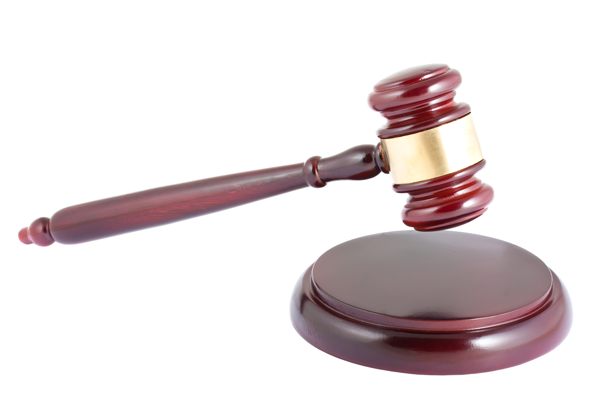 Wooden gavel on white background
