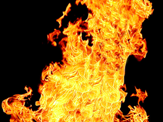 Image with red flame on the black background