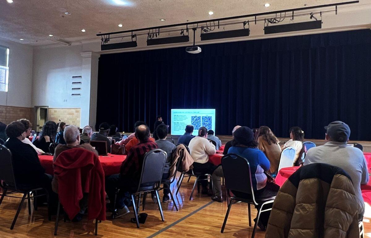 Community members attend a past Community Connectors meeting at the Simms Center.