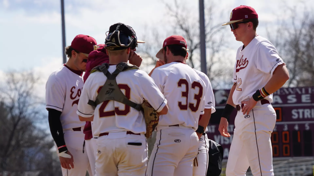 Bridgewater College baseball players huddle together