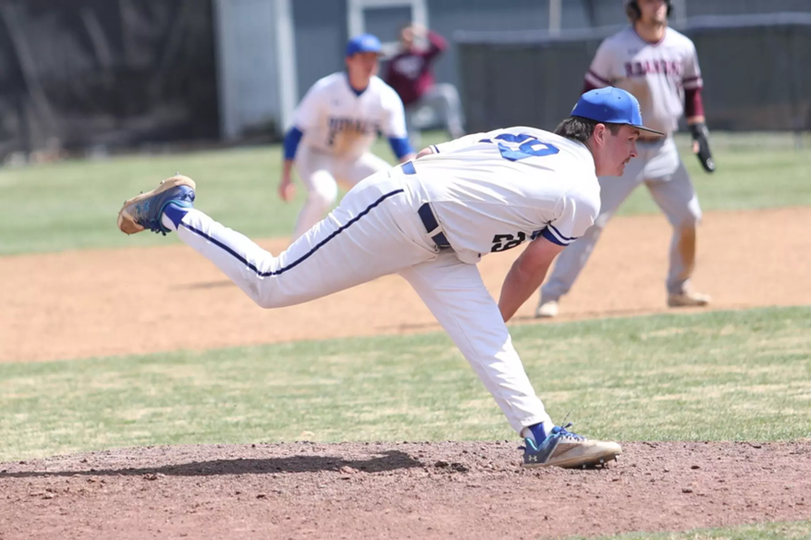 An Eastern Mennonite Baseball player pitches the ball on the mound.