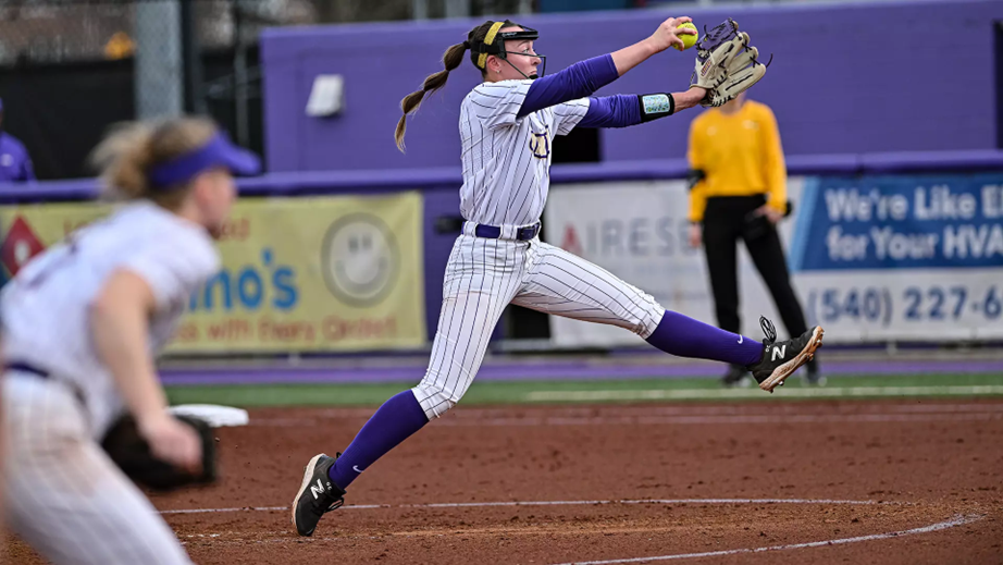 A James Madison University pitcher throws the ball.