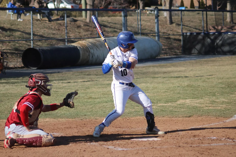 Baseball player going to bat
