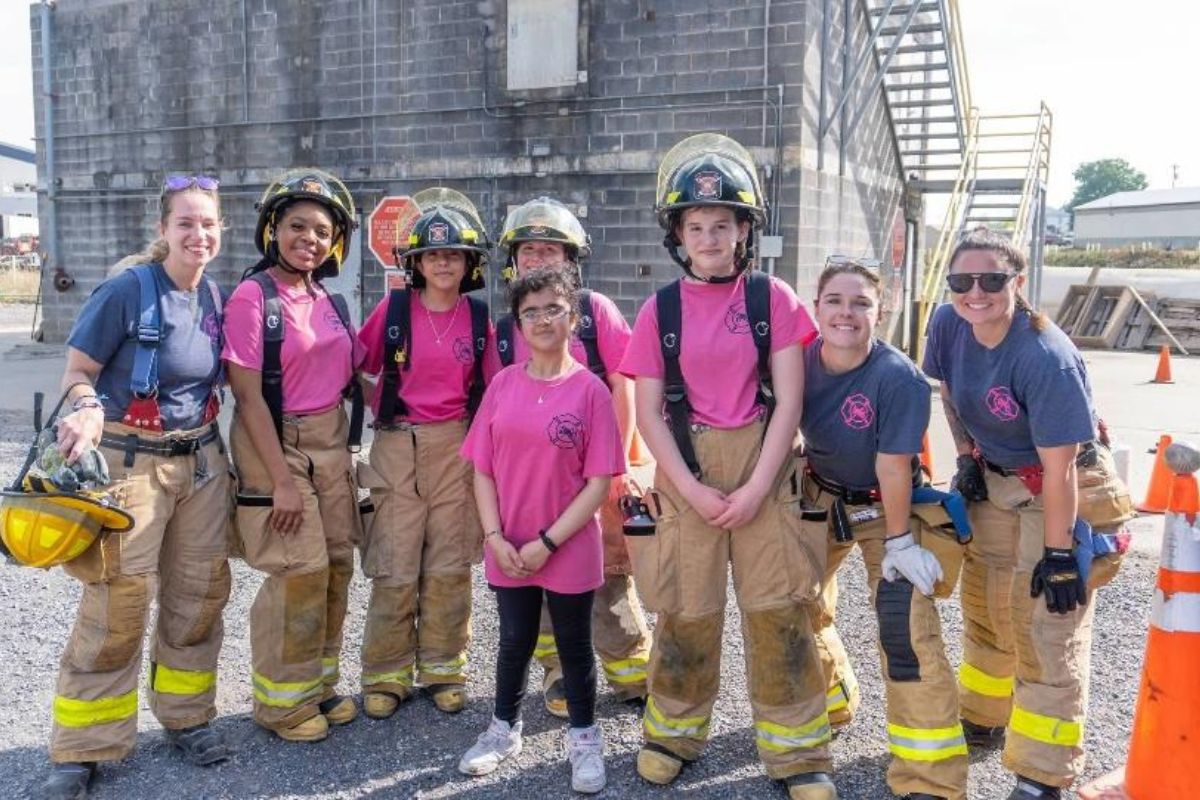 Camp L.I.T. participants with instructors (from left) Firefighter Kellie Sacksteder, Firefighter Leslie Pullen and Firefighter Bell Eyles