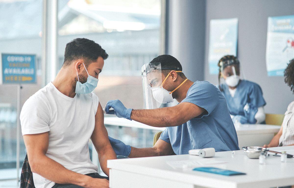Man receiving vaccine