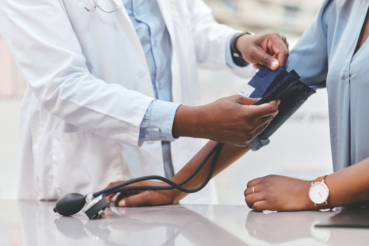 A patient getting their blood pressure taken.