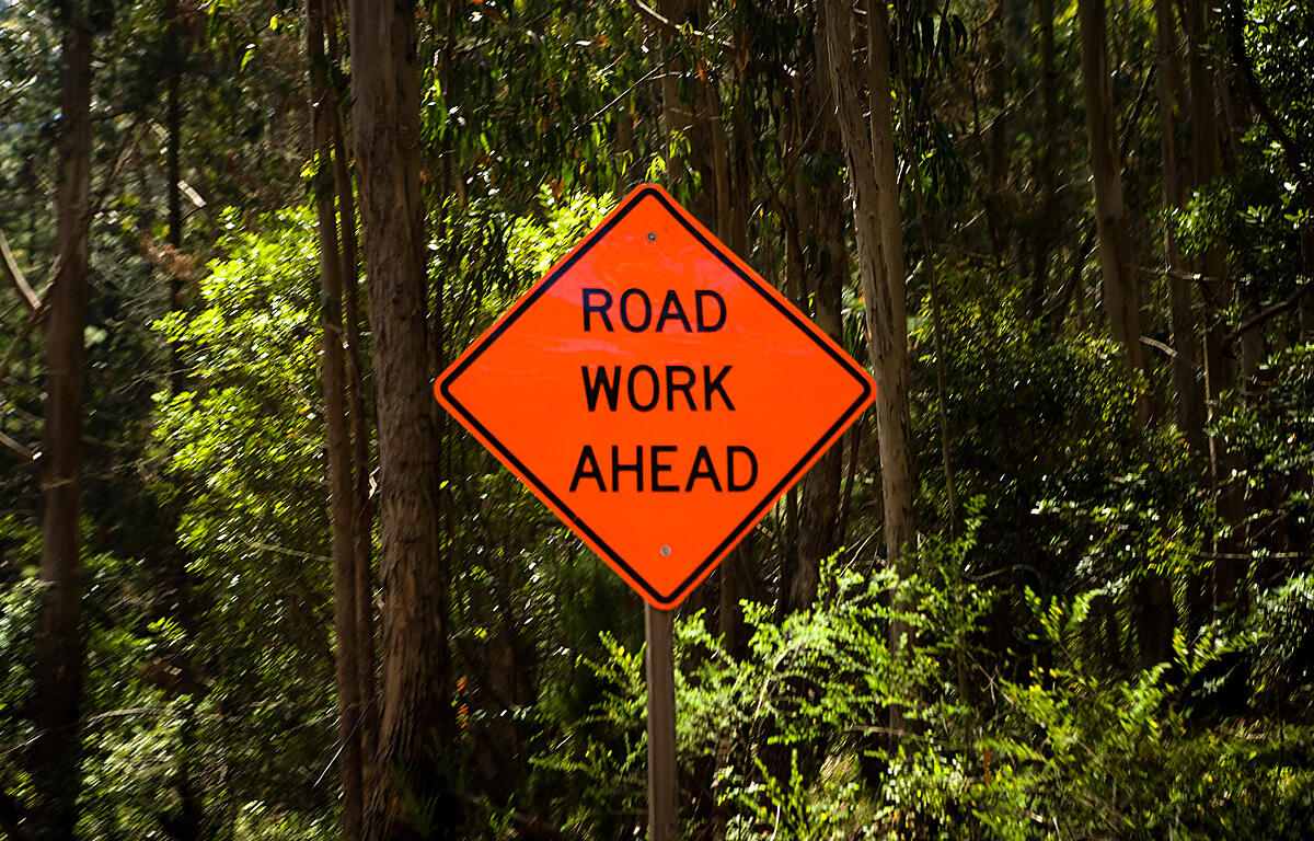 Sign warning of road work ahead