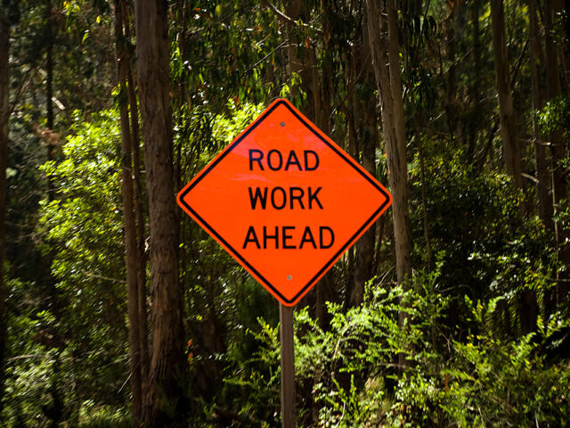 Sign warning of road work ahead