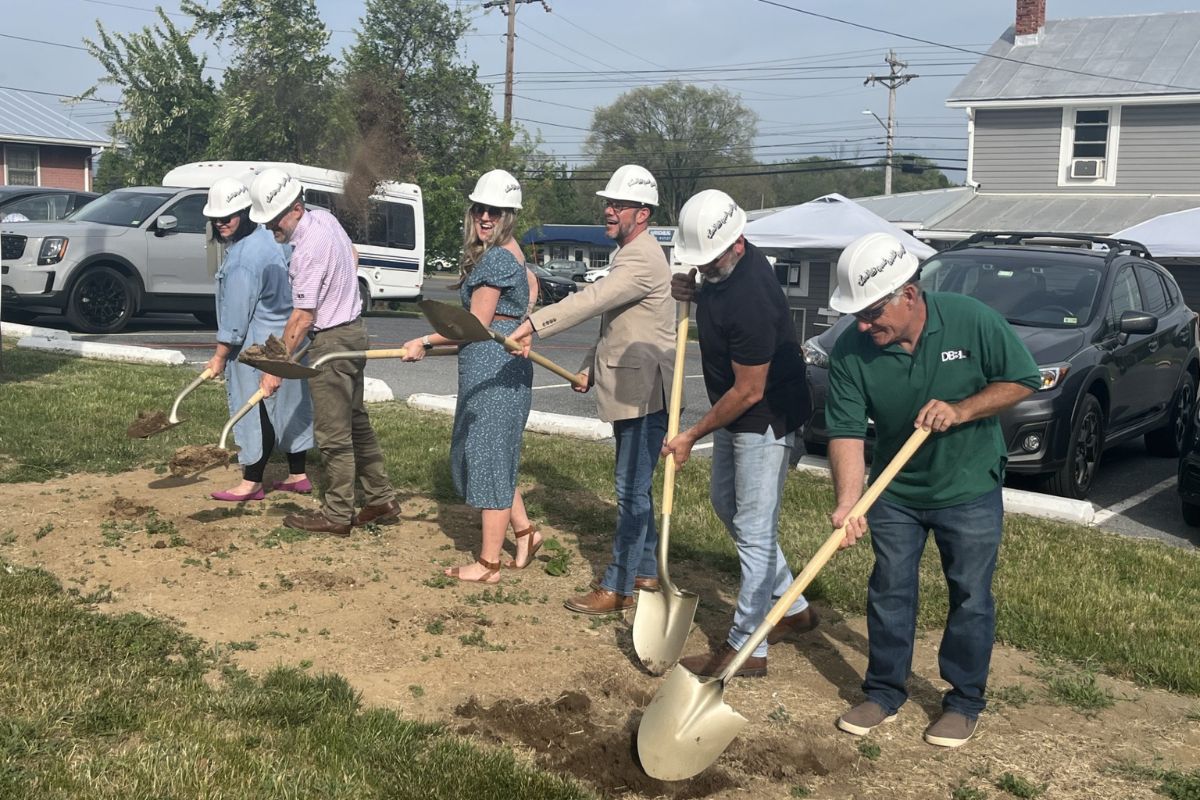 New Creation co-founders and partners breaking ground with shovels