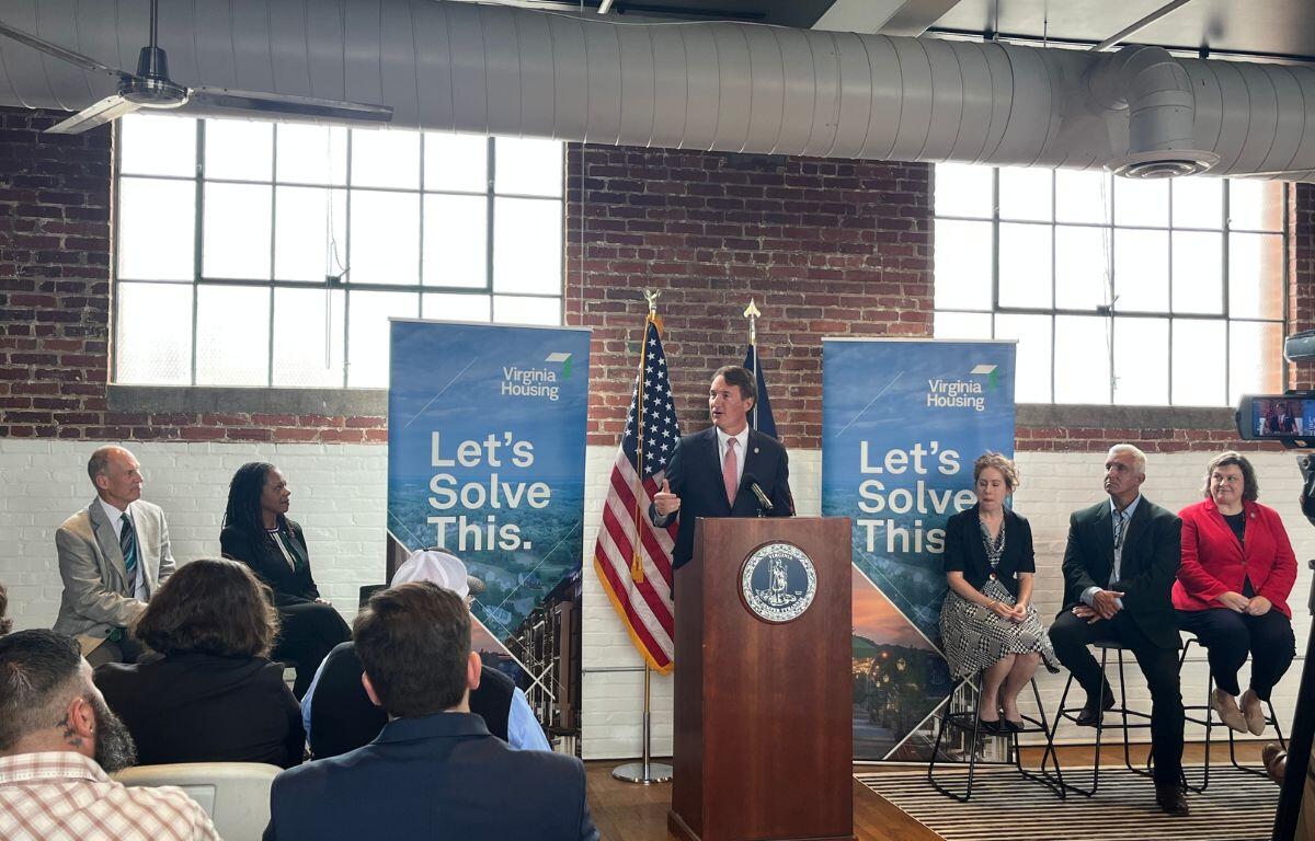 Governor Glenn Youngkin with community partners announcing investments