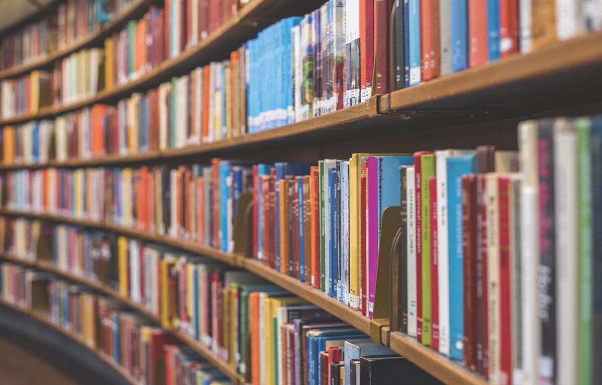Shelves of books in a library.
