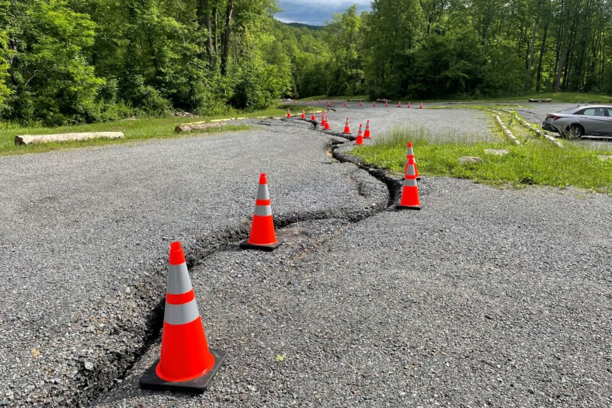 The Old Rag main parking lot with orange cones outlining the biggest ruts in the concrete.