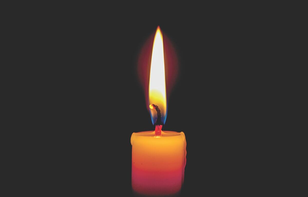 Up close of a candle and flame