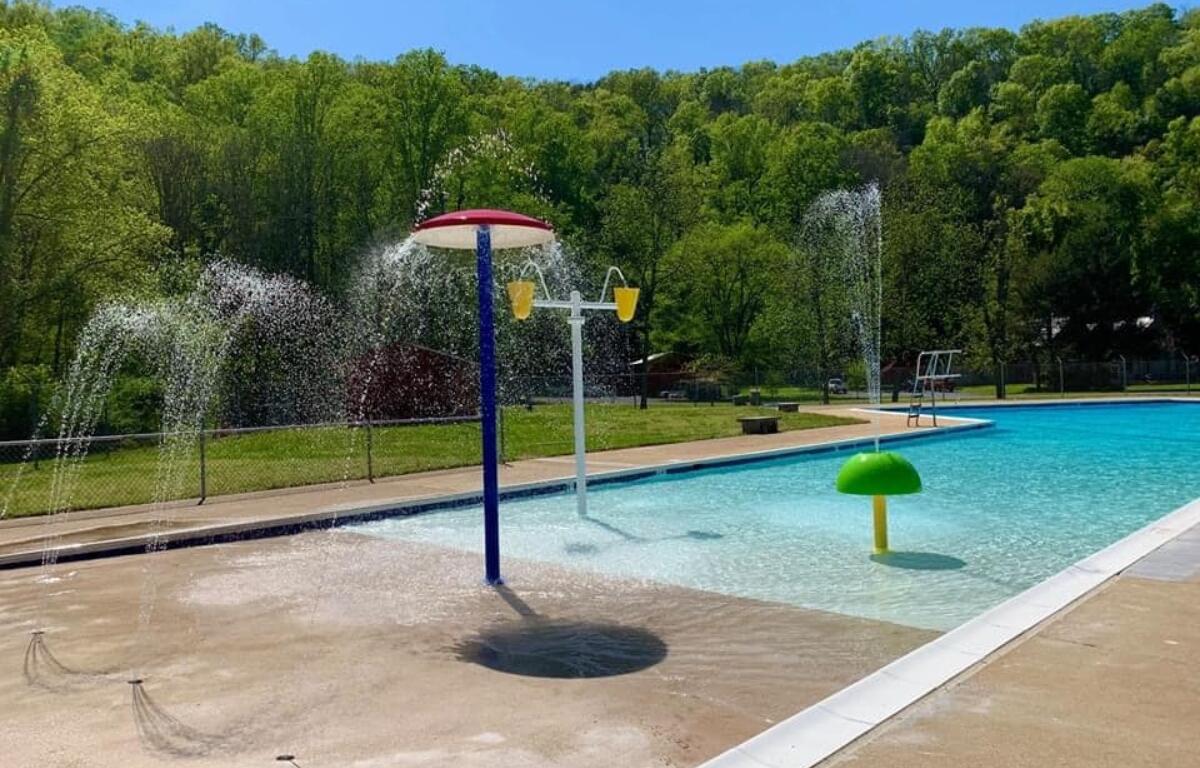 A pool with sprinklers.