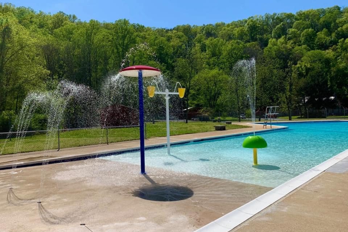 A pool with sprinklers.