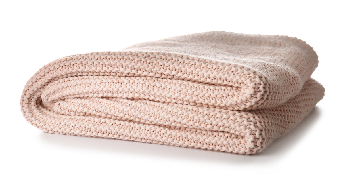Soft blanket on white background