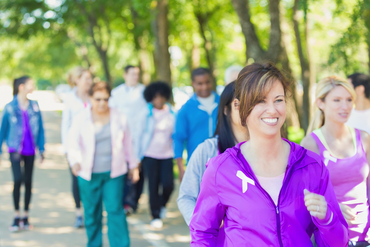 A group of people walking together in a park