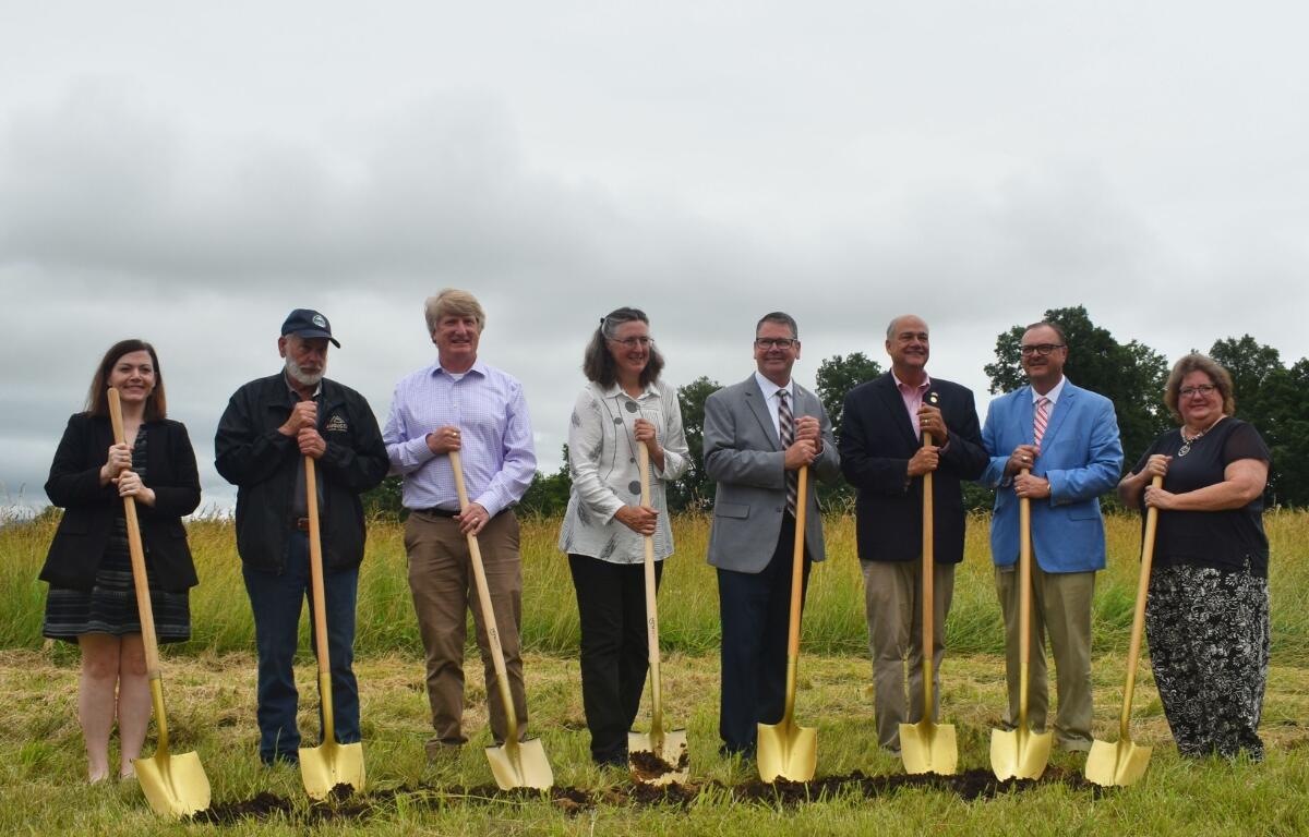 Augusta County officials join Stone Ledge Cider owners in a groundbreaking ceremony.