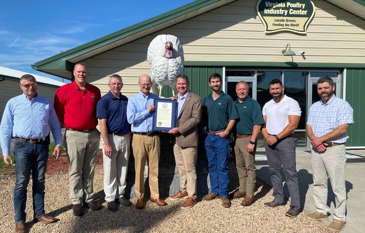 A proclamation plaque is presented by Virginia Secretary of Agriculture and Forestry, Matt Lohr to Virginia Poultry Federation President, Hobey Bauhan at the Virginia Poultry Industry Center at Rockingham County Fairgrounds.
