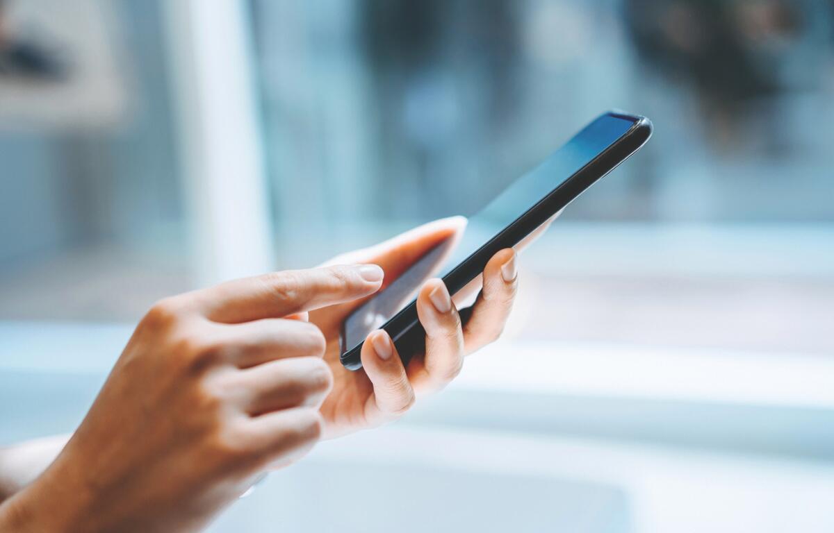 Up close of using a smart phone.