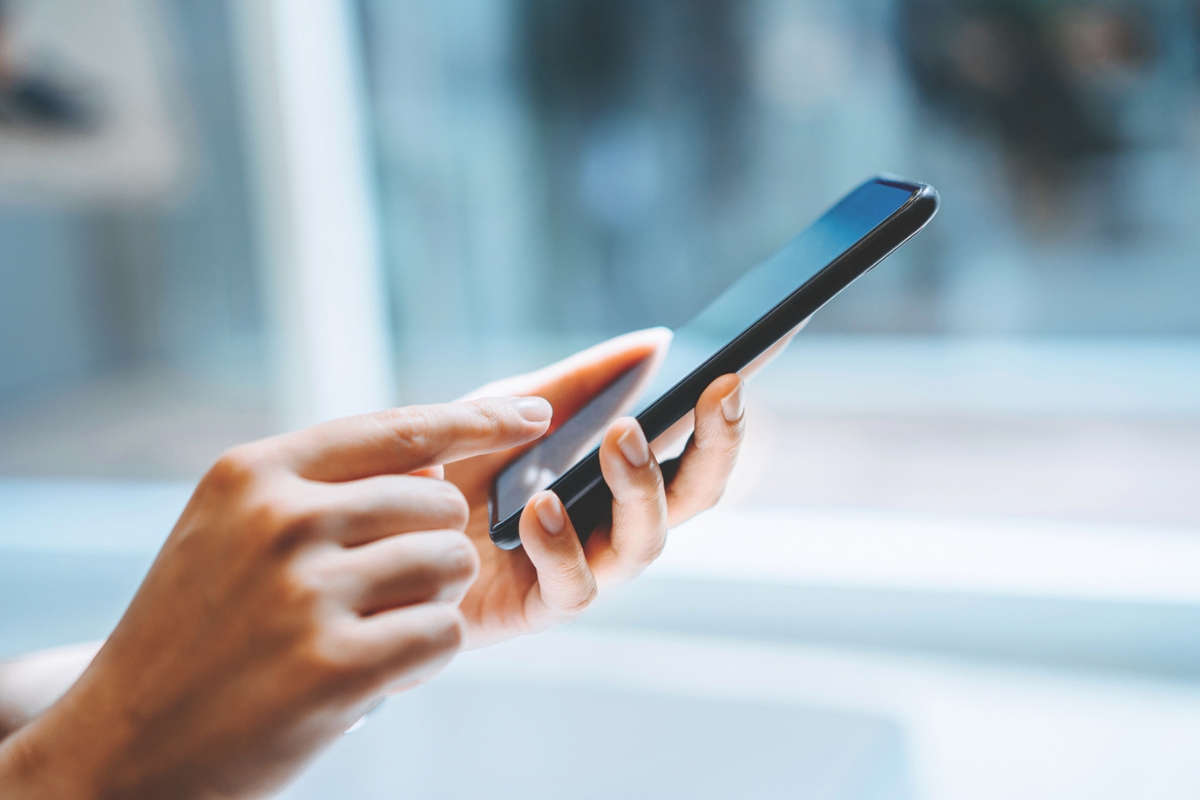 Up close of using a smart phone.