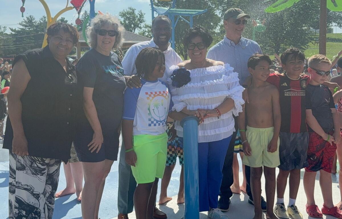 Harrisonburg City Council officials enjoy the new opening of the Spraygrounds.