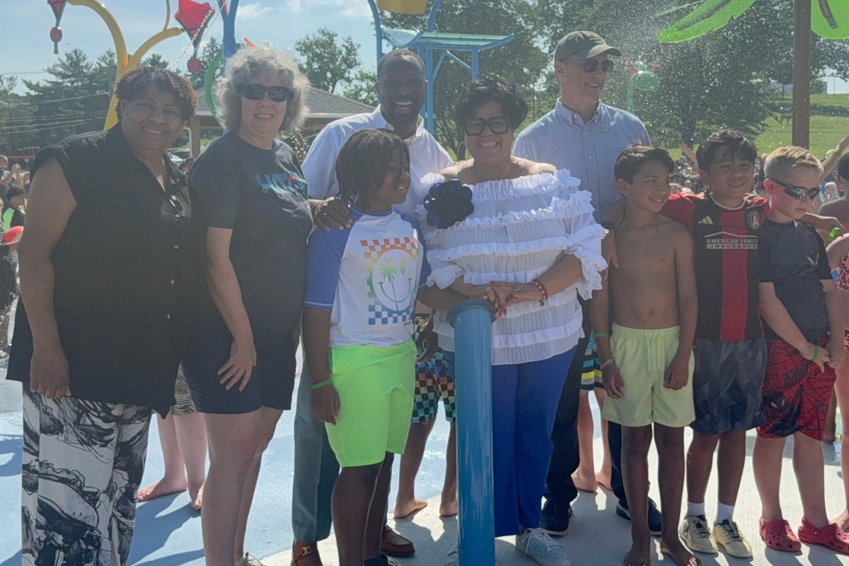 Harrisonburg City Council officials enjoy the new opening of the Spraygrounds.