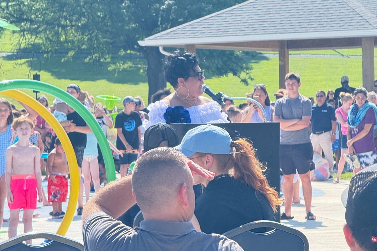 Harrisonburg Mayor Deana Reed speaks at the opening of the spraygrounds.