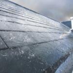 Heavy rain on a roof.