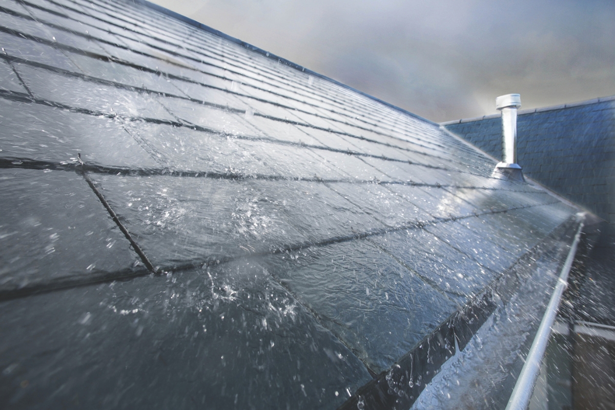 Heavy rain on a roof.