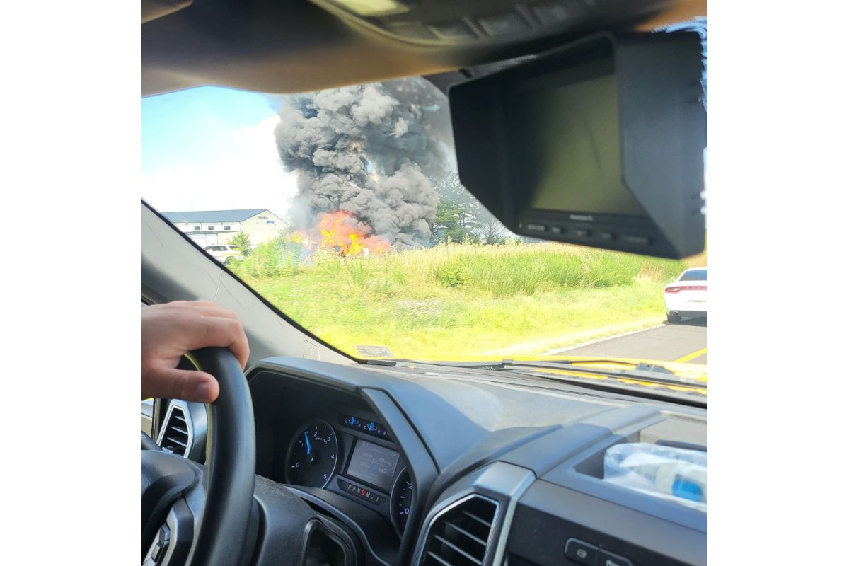 Photo of dump truck fire from a vehicle