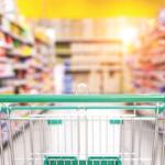 Grocery store cart in an aisle