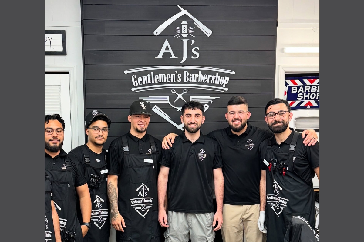 Staff photo of AJ's Gentleman Barbershop.