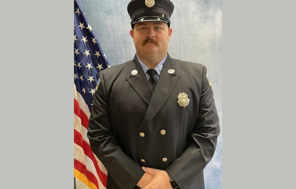 A headshot photo of Zack Reese in uniform.