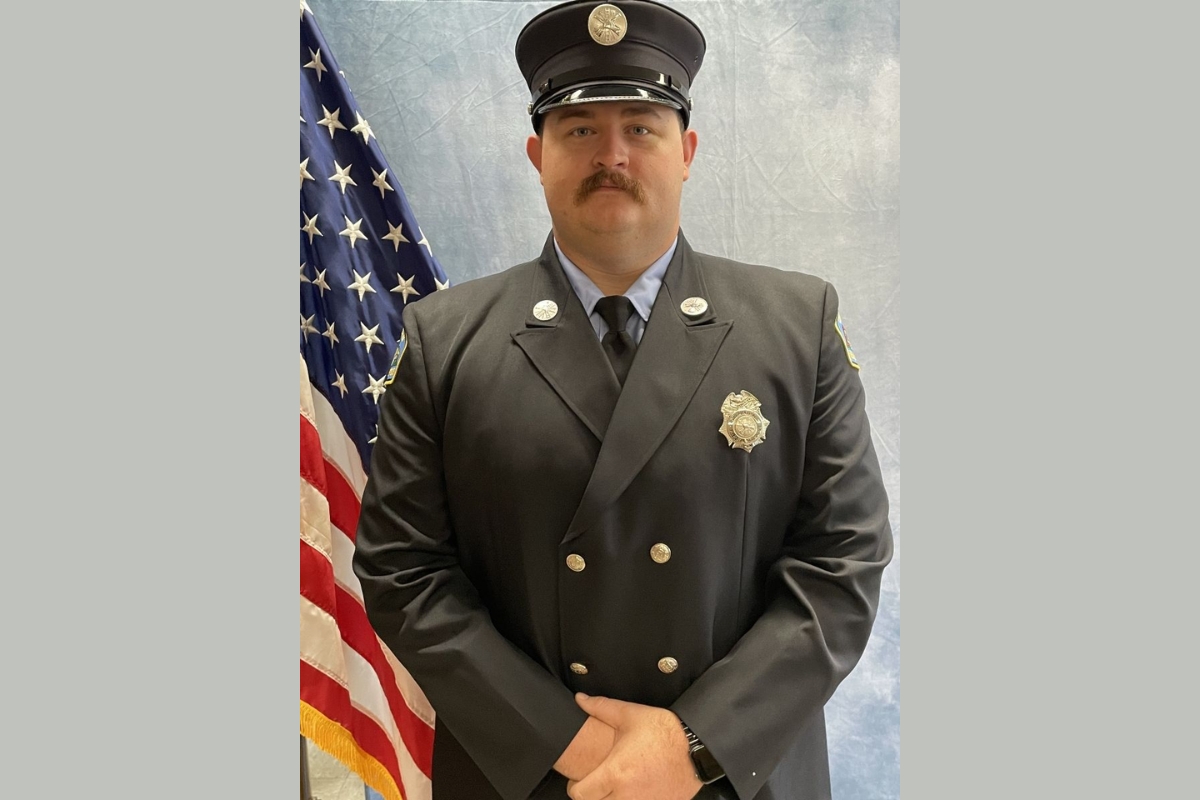 A headshot photo of Zack Reese in uniform.