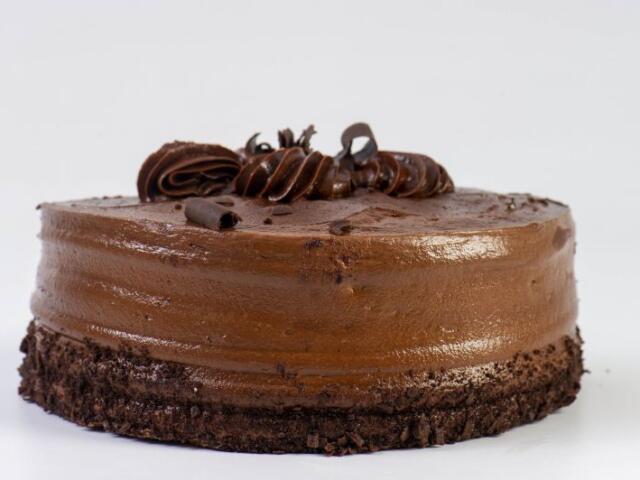 A chocolate frosted cake.