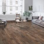 An overview of a living room with dark hardwood flooring.