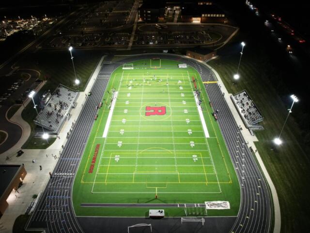An overview of the Rocktown High School football field at night
