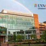 UVA Health Children's hospital with a rainbow above it.