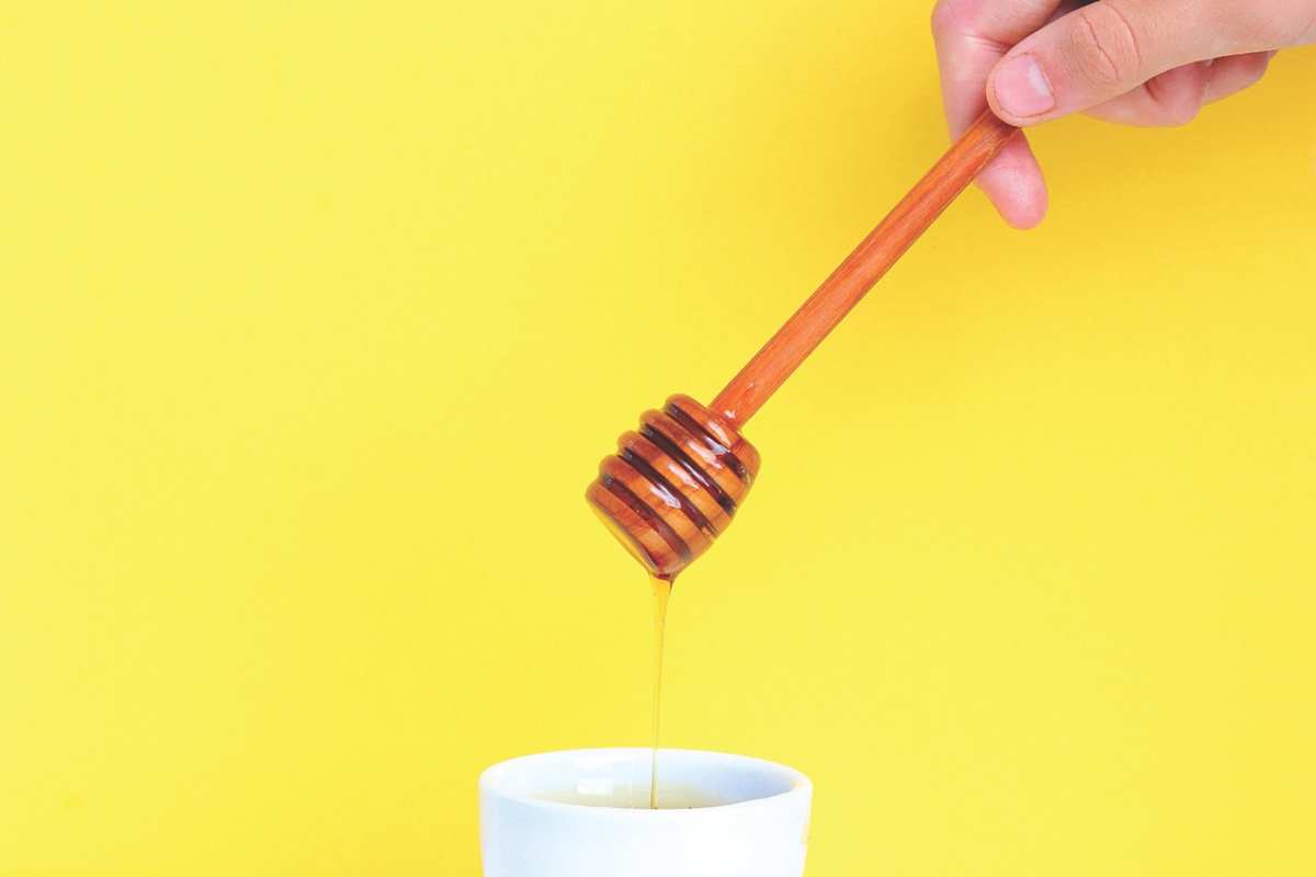 Up close of honey in a jar.