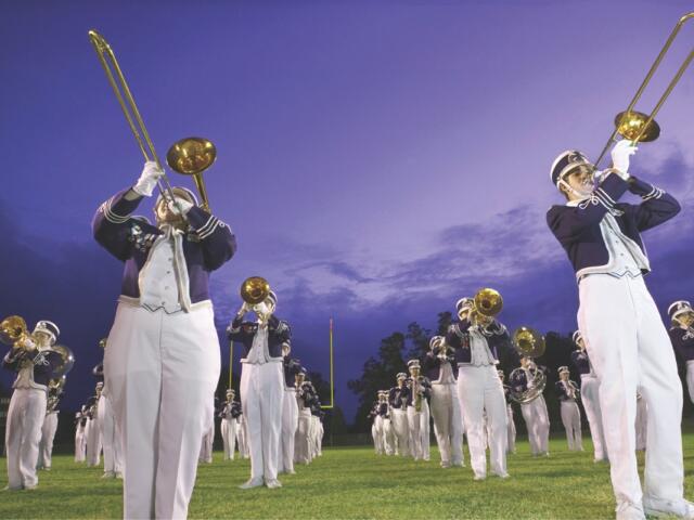 A marching band on a field.