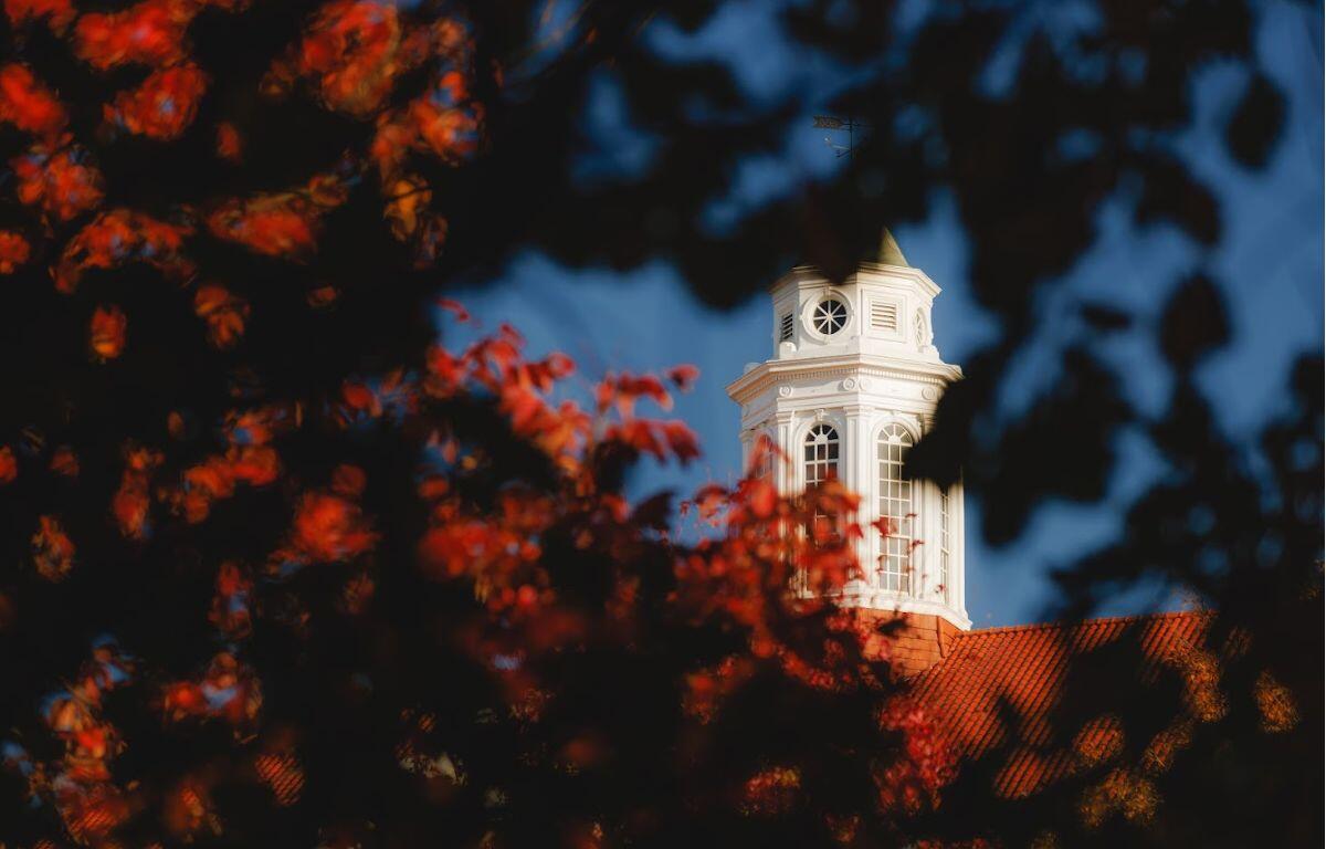 Wilson Hall with fall leaves