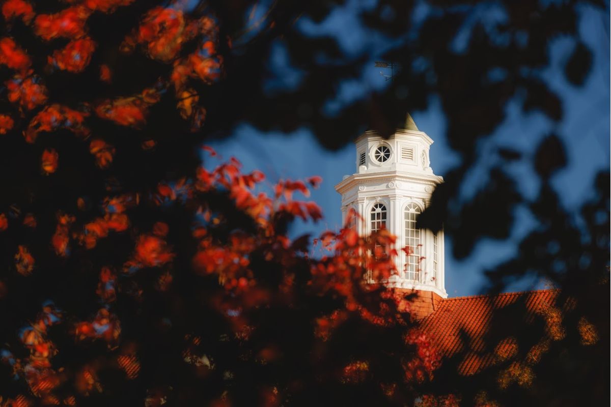 Wilson Hall with fall leaves