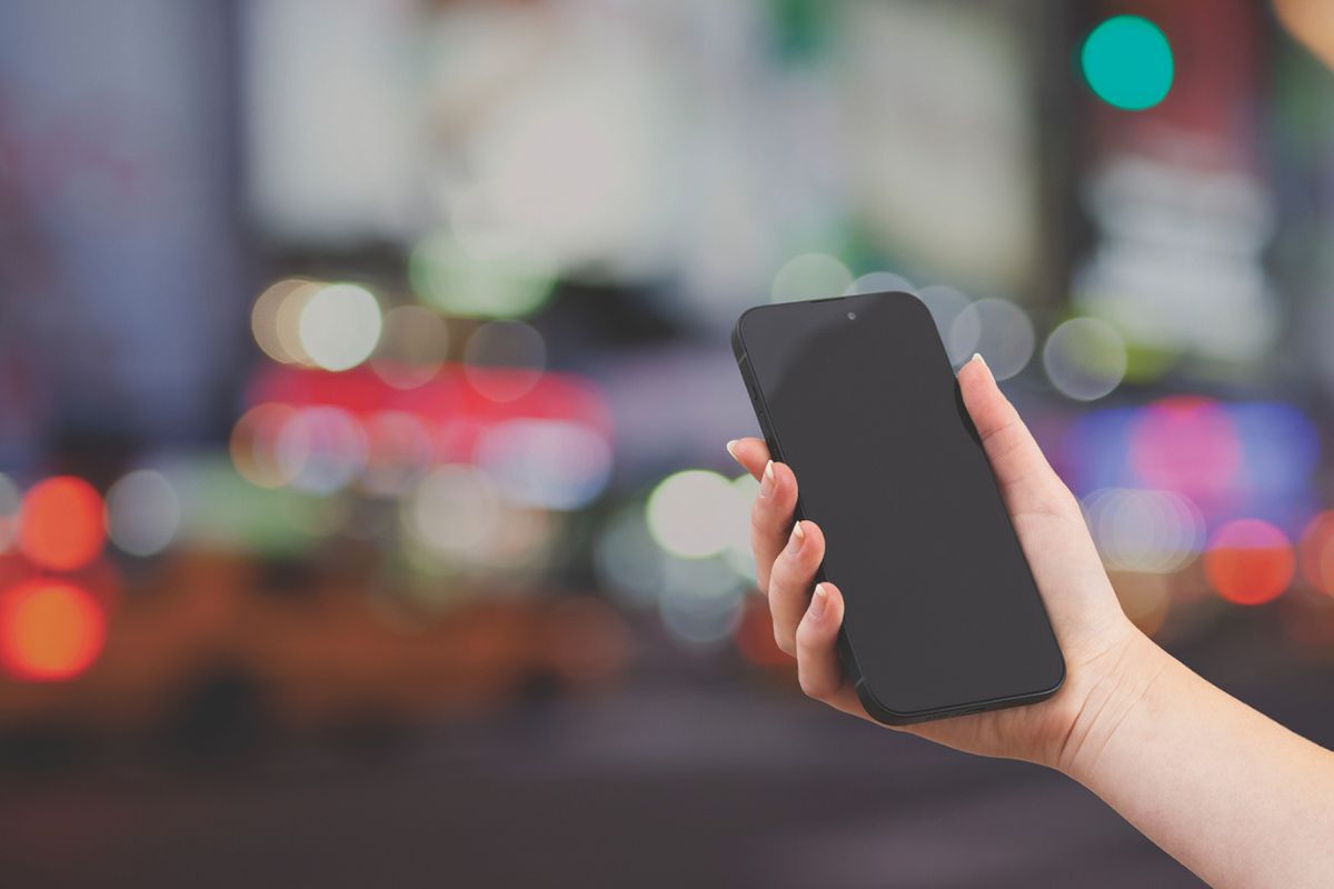 Person holding a cell phone