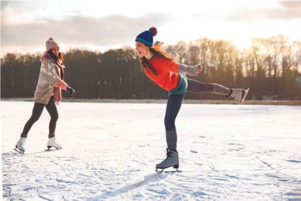 Two women ice skating