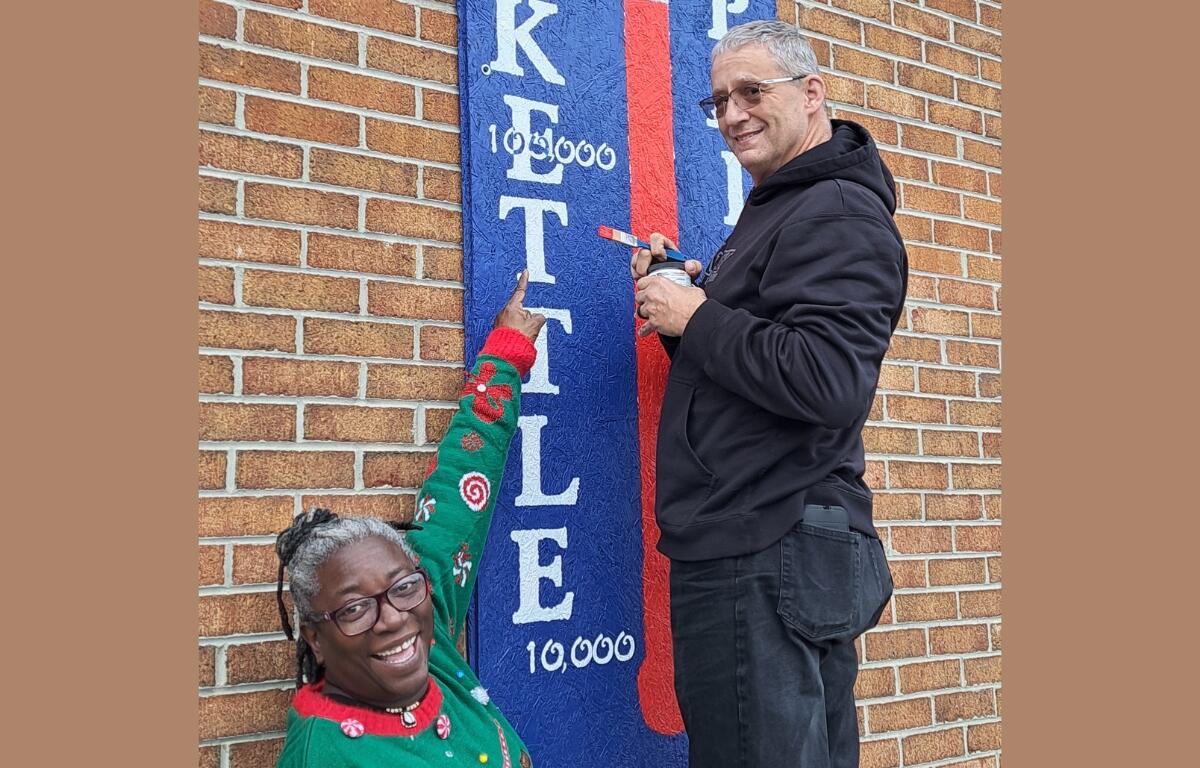 Lieutenants Douglas and Sharon Ingold fill in their chart marking how much money has been raised.