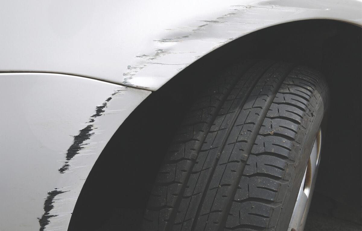 Up close of a tire on a car.