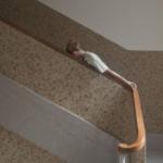 Boy standing on the stairwell