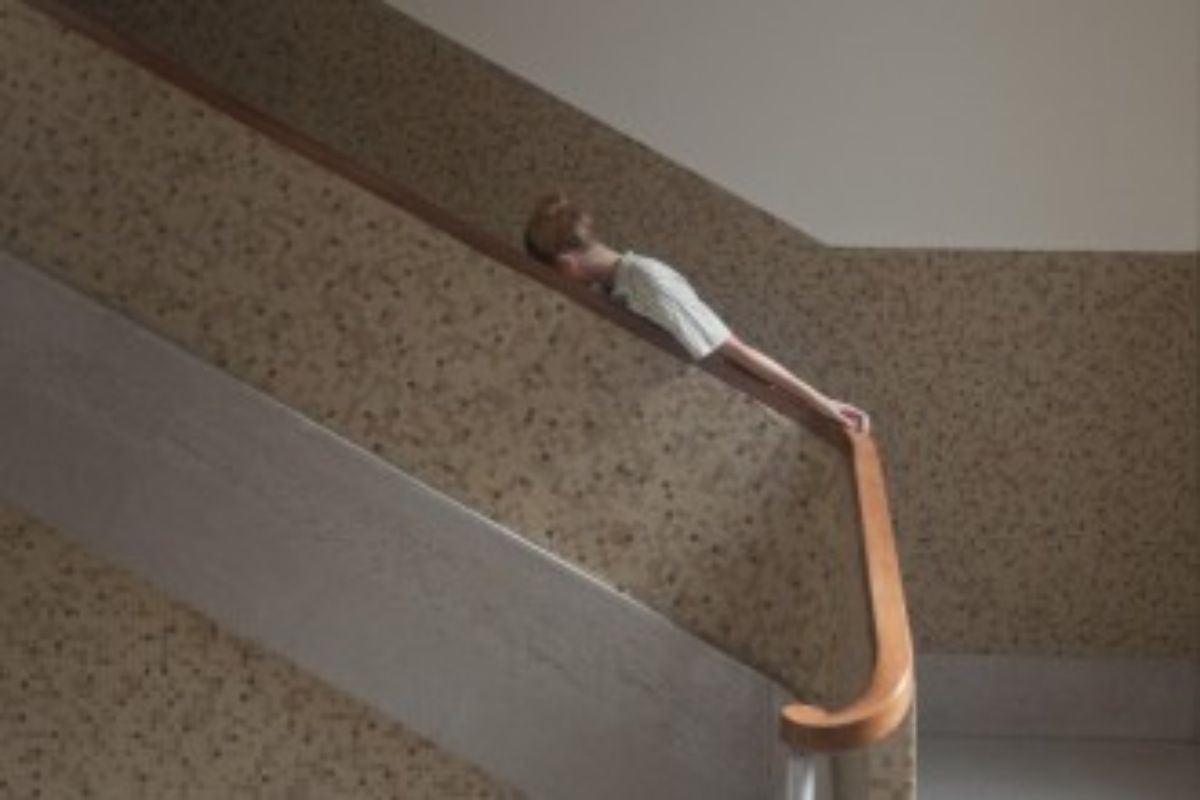 Boy standing on the stairwell